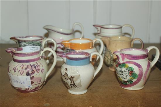 8 small lustre  jugs